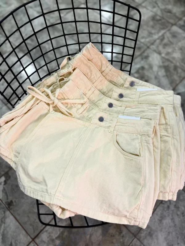 SHORT POLLERA AMARILLO PASTEL