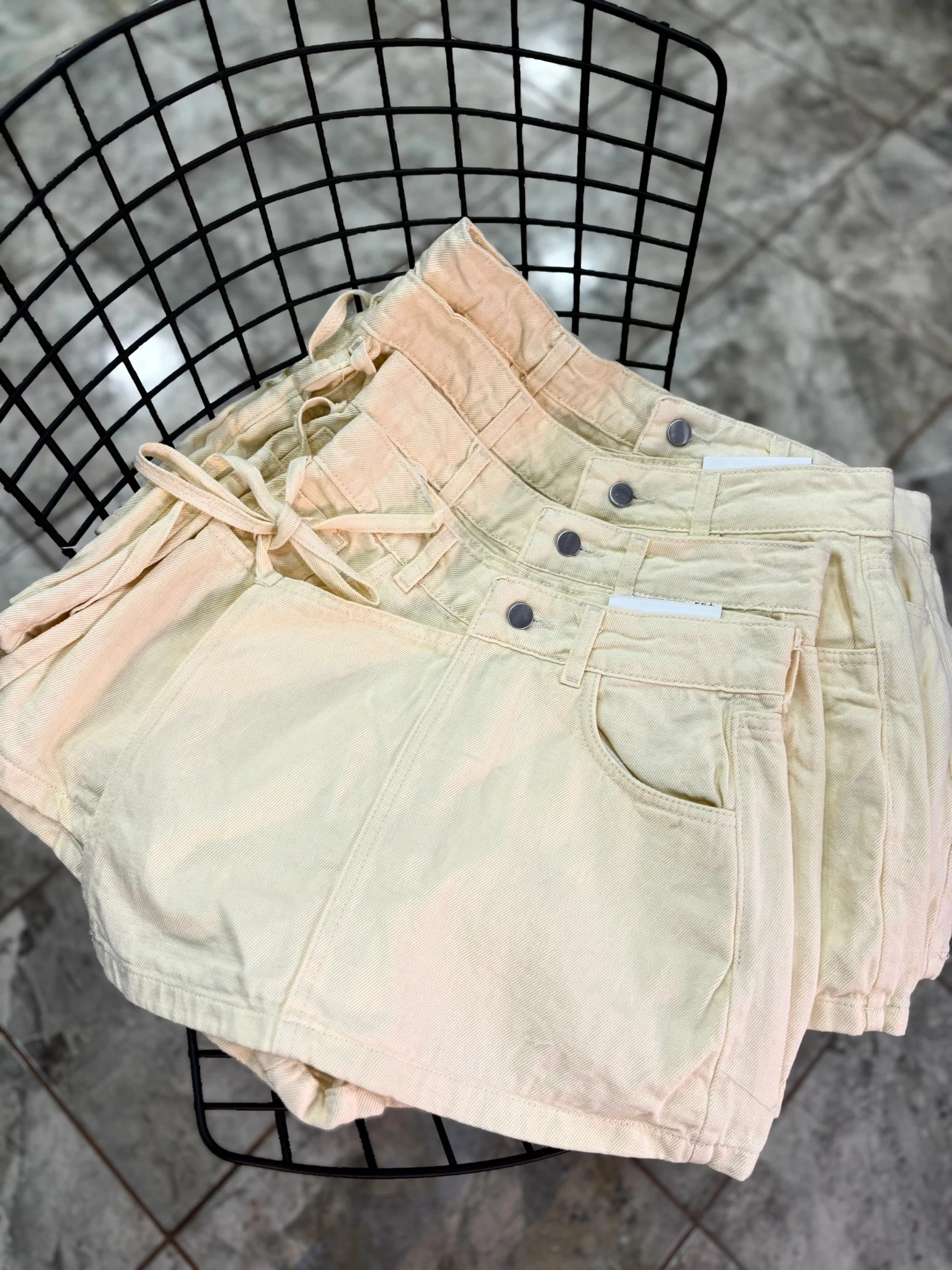 SHORT POLLERA AMARILLO PASTEL